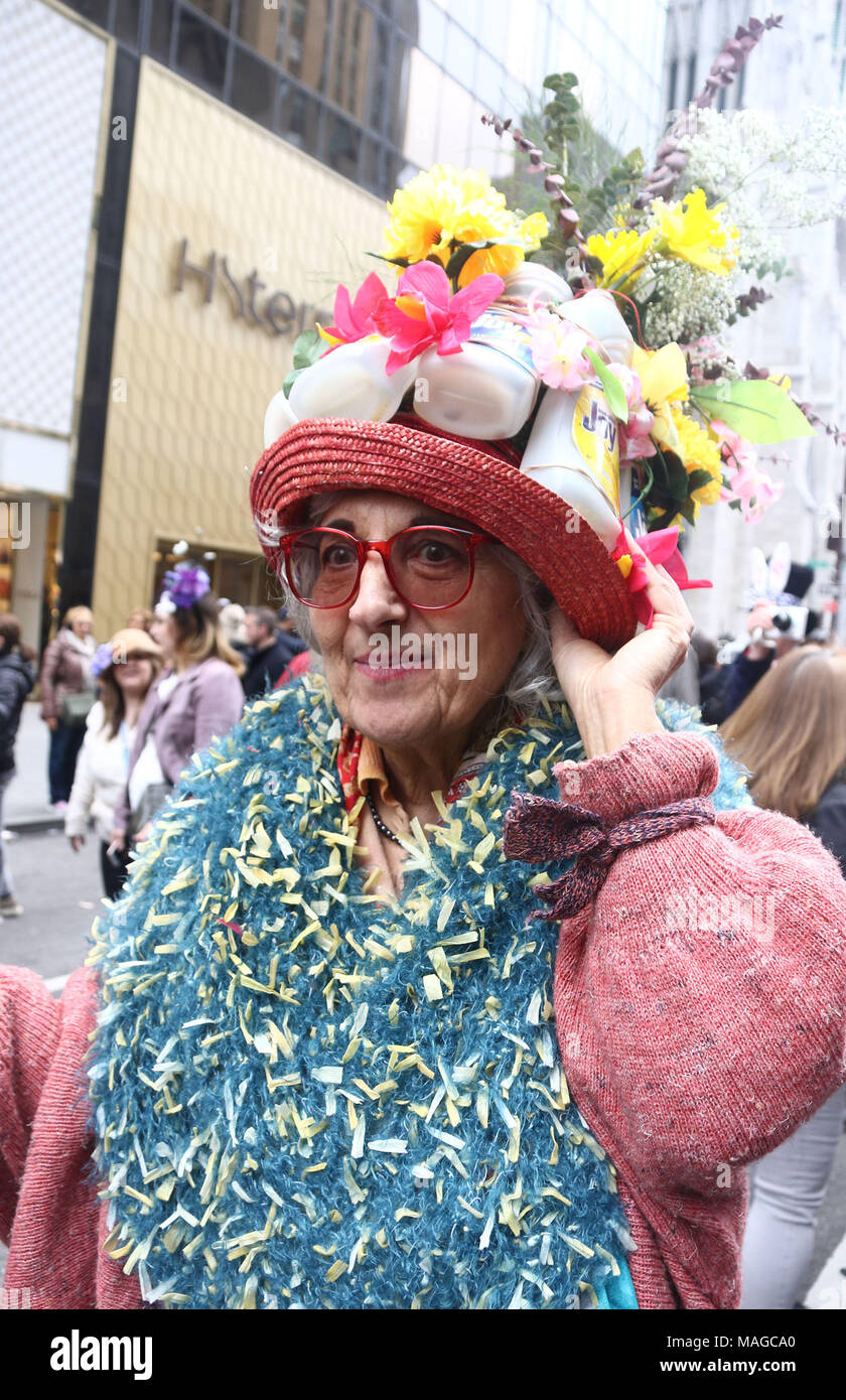 New York City, New York, USA. 1st Apr, 2018. A parade goer attends the