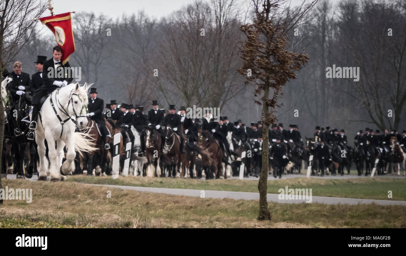 Lausitz, Germany. 1st Apr, 2018. Easter riders coming from Wittichenau. Easter riders with white horses and sorbain banners leading this Sorbian Easter Procession (Osterreiten) Credit: Krino/Alamy Live News Stock Photo
