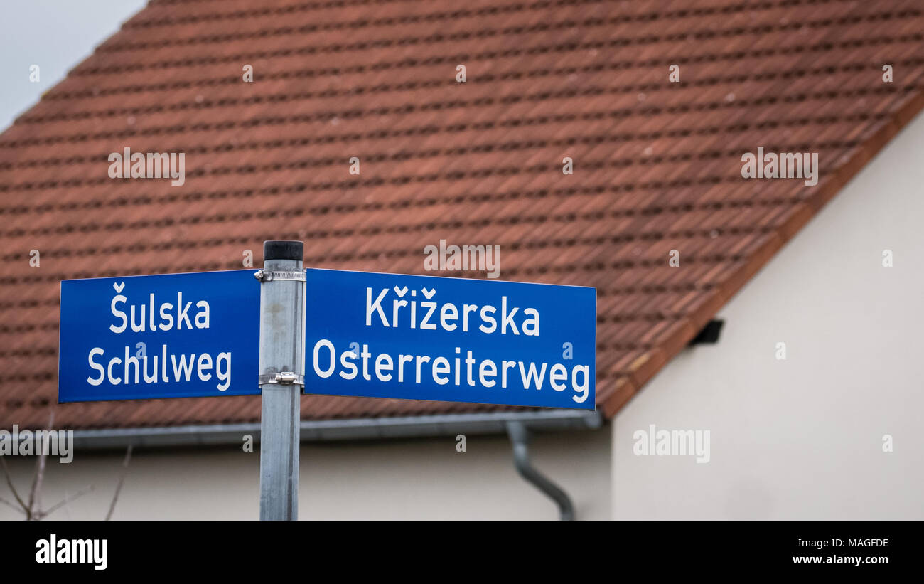Lausitz, Germany. 1st Apr, 2018. Osterreiterweg street sign. The easter riders procession always rides along this street when passing Cunnewitz. Credit: Krino/Alamy Live News Stock Photo