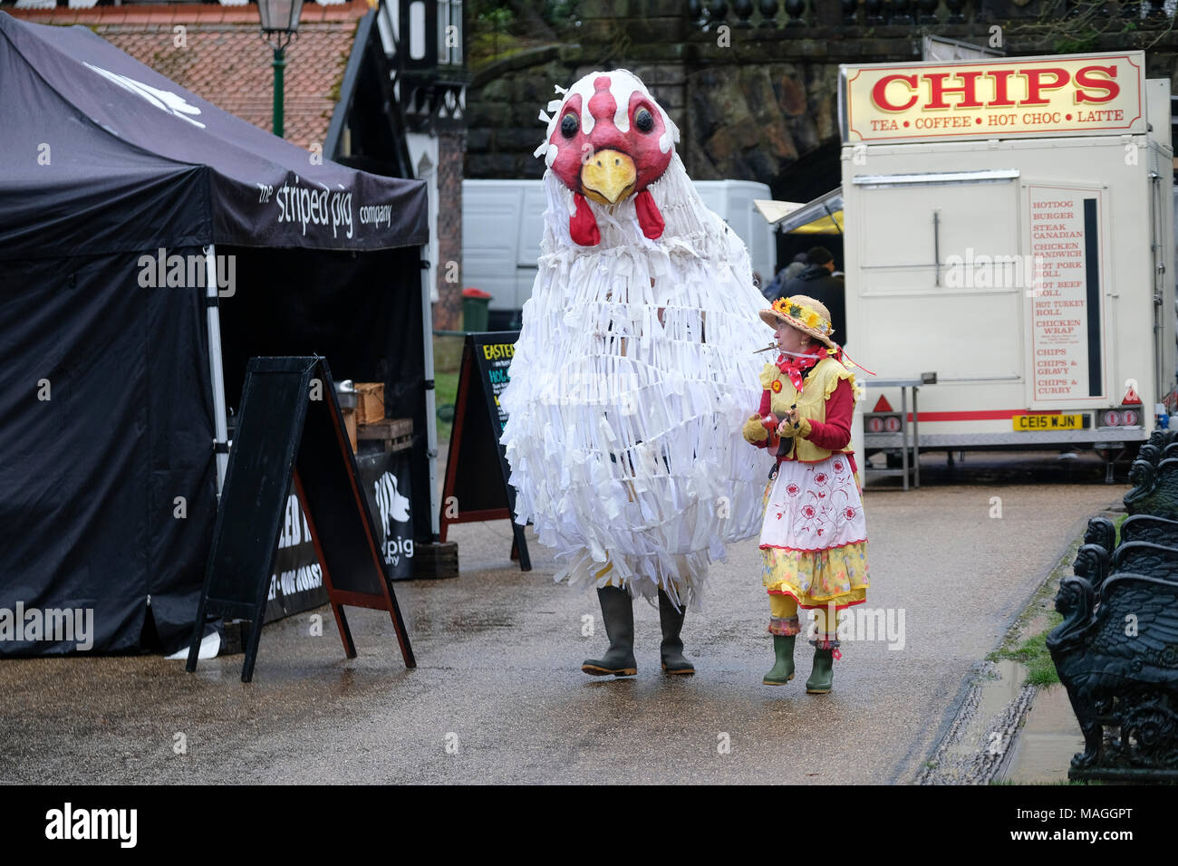 Preston, UK. 2nd April, 2018. It was a cold and damp day on Avenham Park in Preston, the venue for the traditional Easter egg rolling event.  It’s normally one of Preston’s biggest events of the year. Despite the weather the people of Preston still turned out in numbers, albeit fewer than usual to enjoy the egg rolling and entertainment throughout the day.   The tradition of rolling eggs down the grassy park hills goes back hundreds of years and is sometimes referred to as ‘pace egging’. Credit: Paul Melling/Alamy Live News Stock Photo