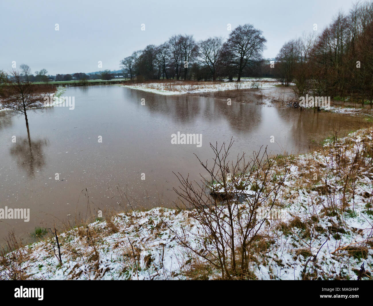 Ashbourne, Derbyshire. 2nd Apr, 2018. UK Weather: 1' of morning snow quickly melts causing flooding on Easter Bank Holiday Monday in Ashbourne, Derbyshire Credit: Doug Blane/Alamy Live News Stock Photo