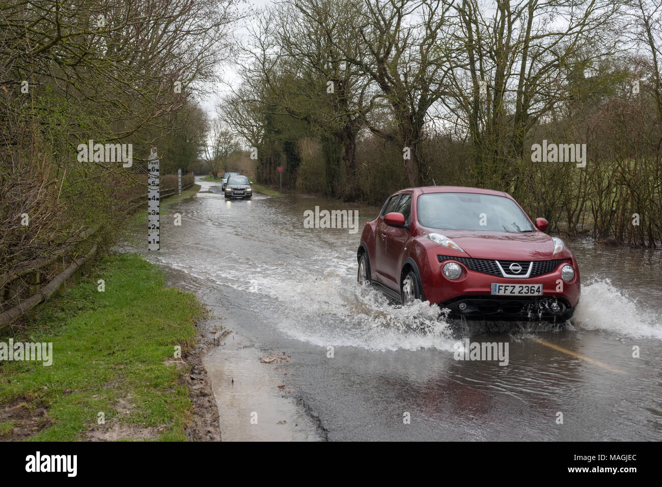 Bidford on Avon Warwickshire England UK Marcg 2nd 2018 cars passing through standing water after