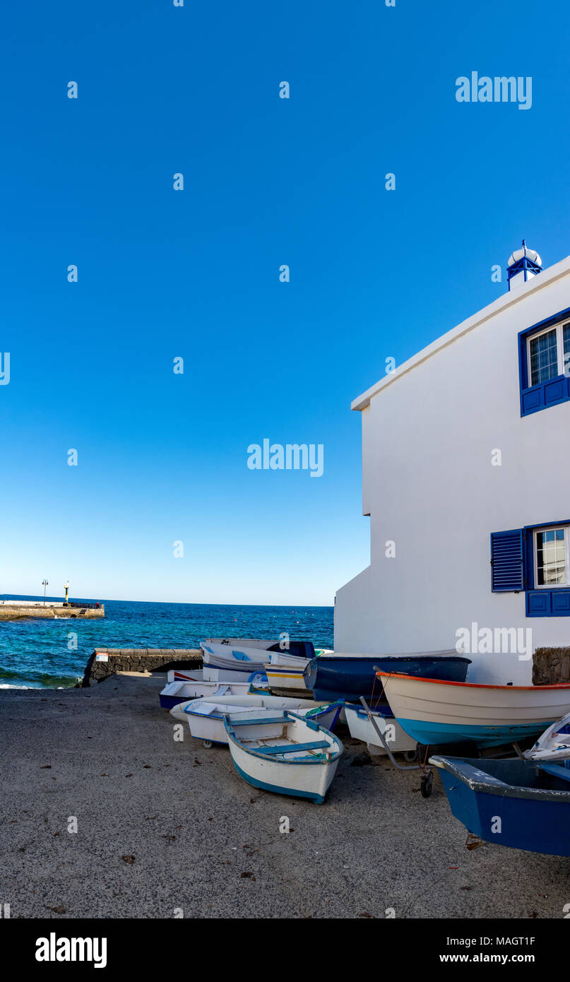 Sunset over the sea landscape with old blue wooden fishing boat Stock ...