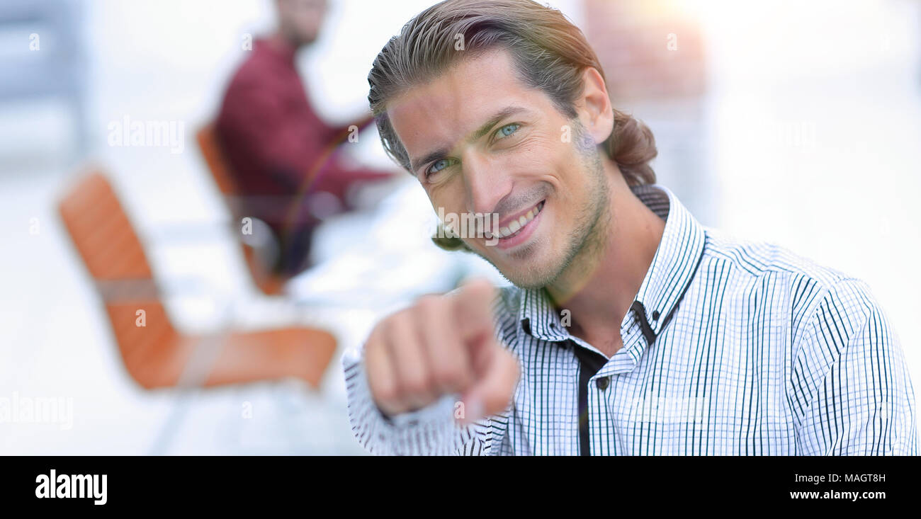 successful man pointing his finger forward Stock Photo - Alamy