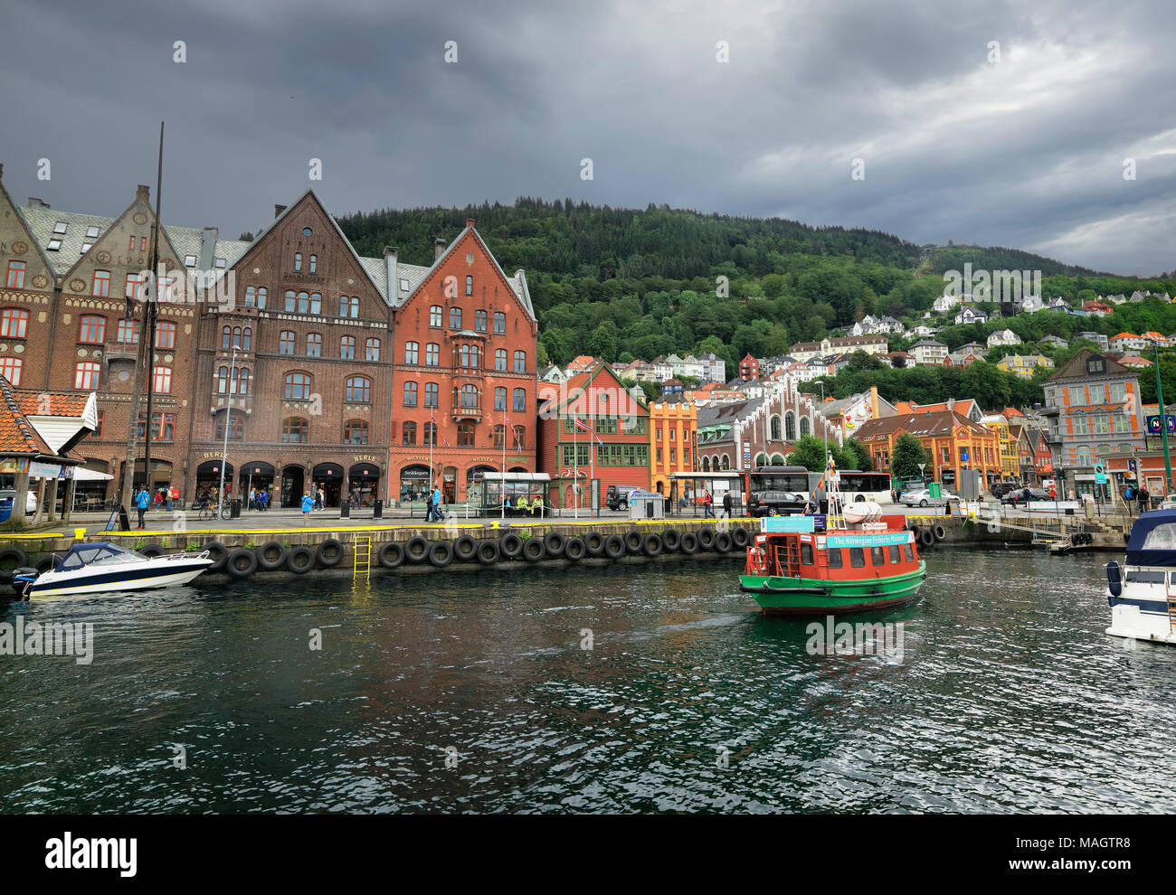 Cityscape with quay and street with old wooden houses in harbour of Bergen. Norway, Scandinavia Stock Photo