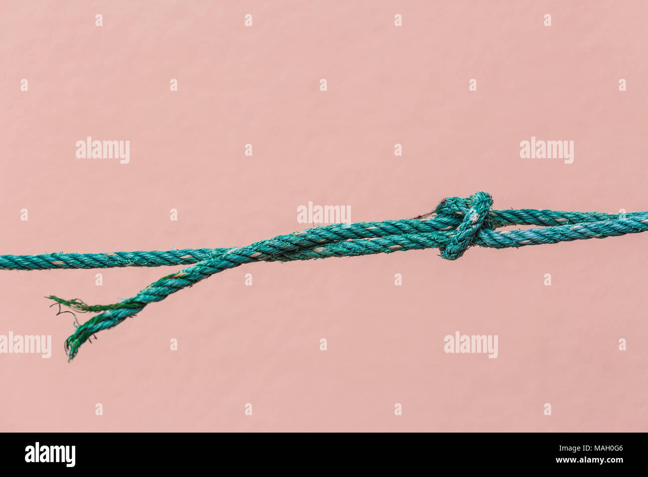Nylon rope is about to break Stock Photo