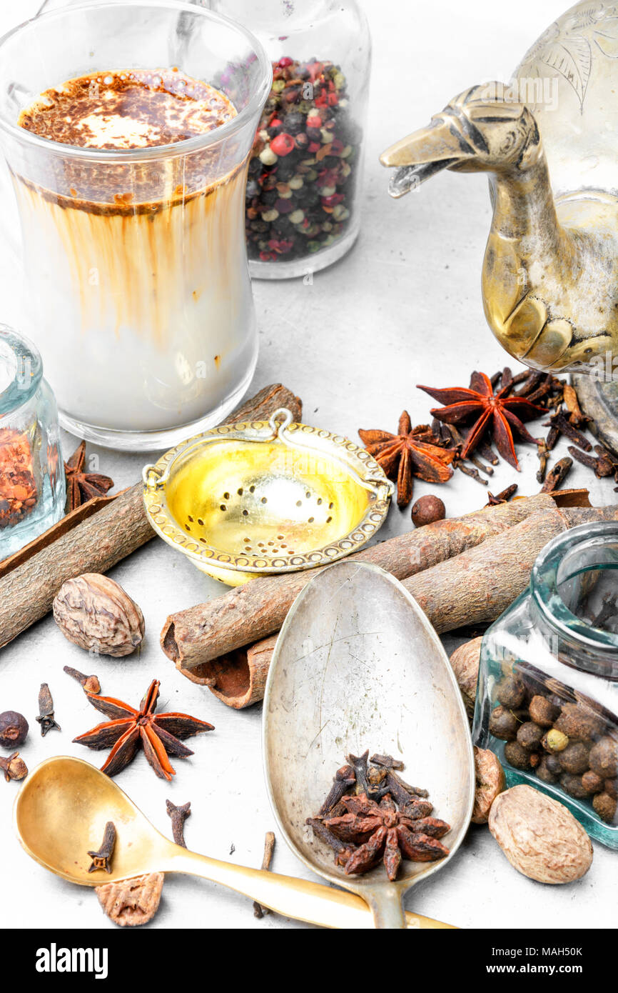 Glass cup of traditional indian masala tea.Masala chai Stock Photo - Alamy