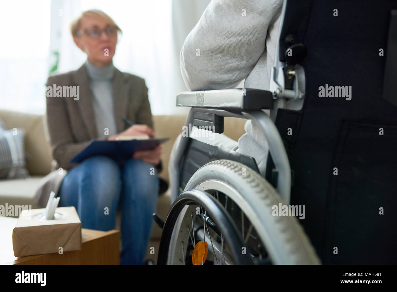 Therapist Working with Handicapped Patient Stock Photo