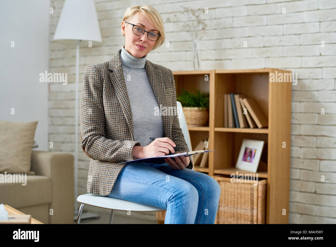 Female Psychologist in Office Stock Photo