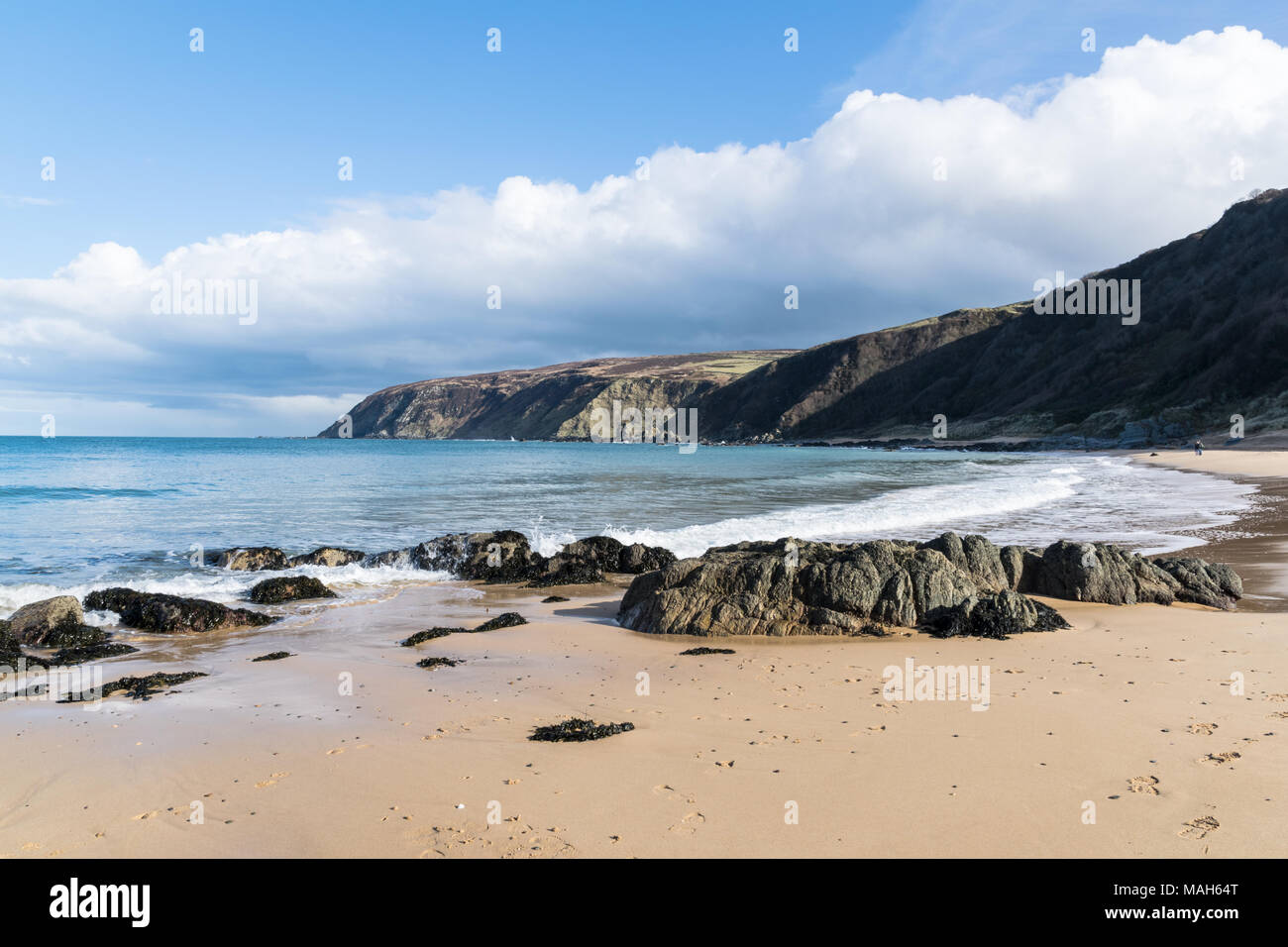 This is Kinnagoe Bay in County Donegal in Ireland. It has white sandy beaches with turquoise water. Stock Photo
