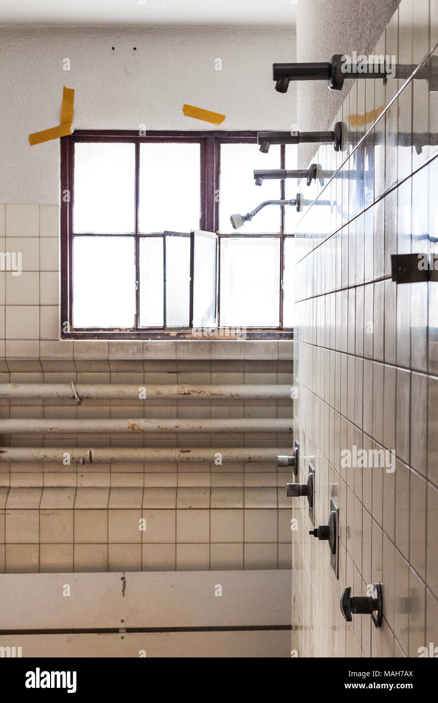 Shower head in old gym Stock Photo Alamy