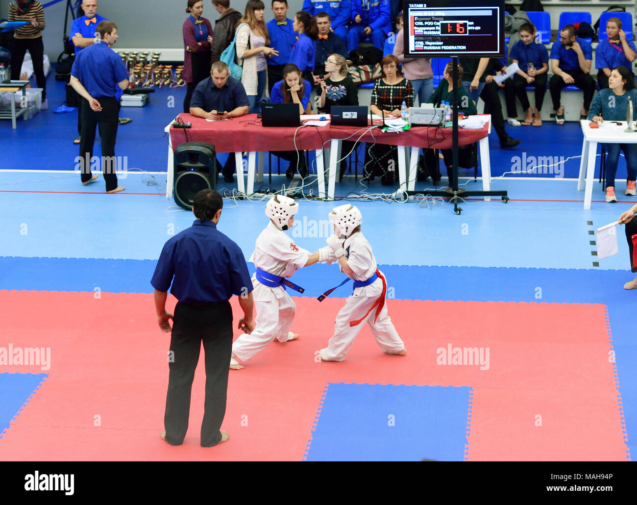 Competition among children in karate,kumite.Duel of two teenagers in karate competitions Stock Photo