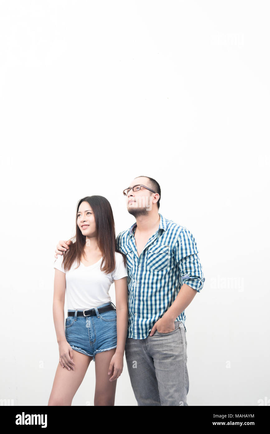 Portrait of young happy couple isolated on white background Stock Photo ...