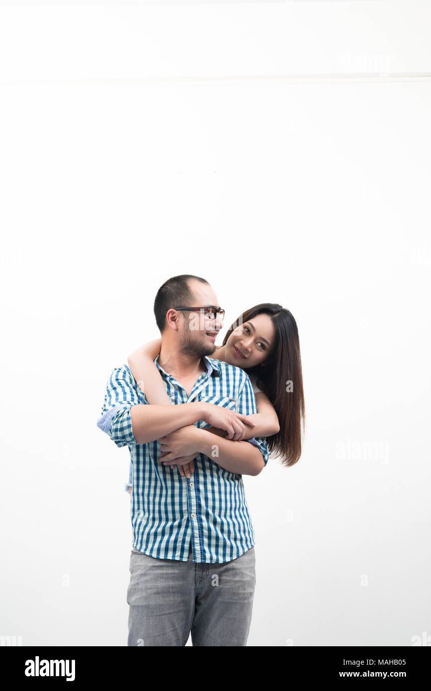 Portrait of young happy couple isolated on white background Stock Photo ...