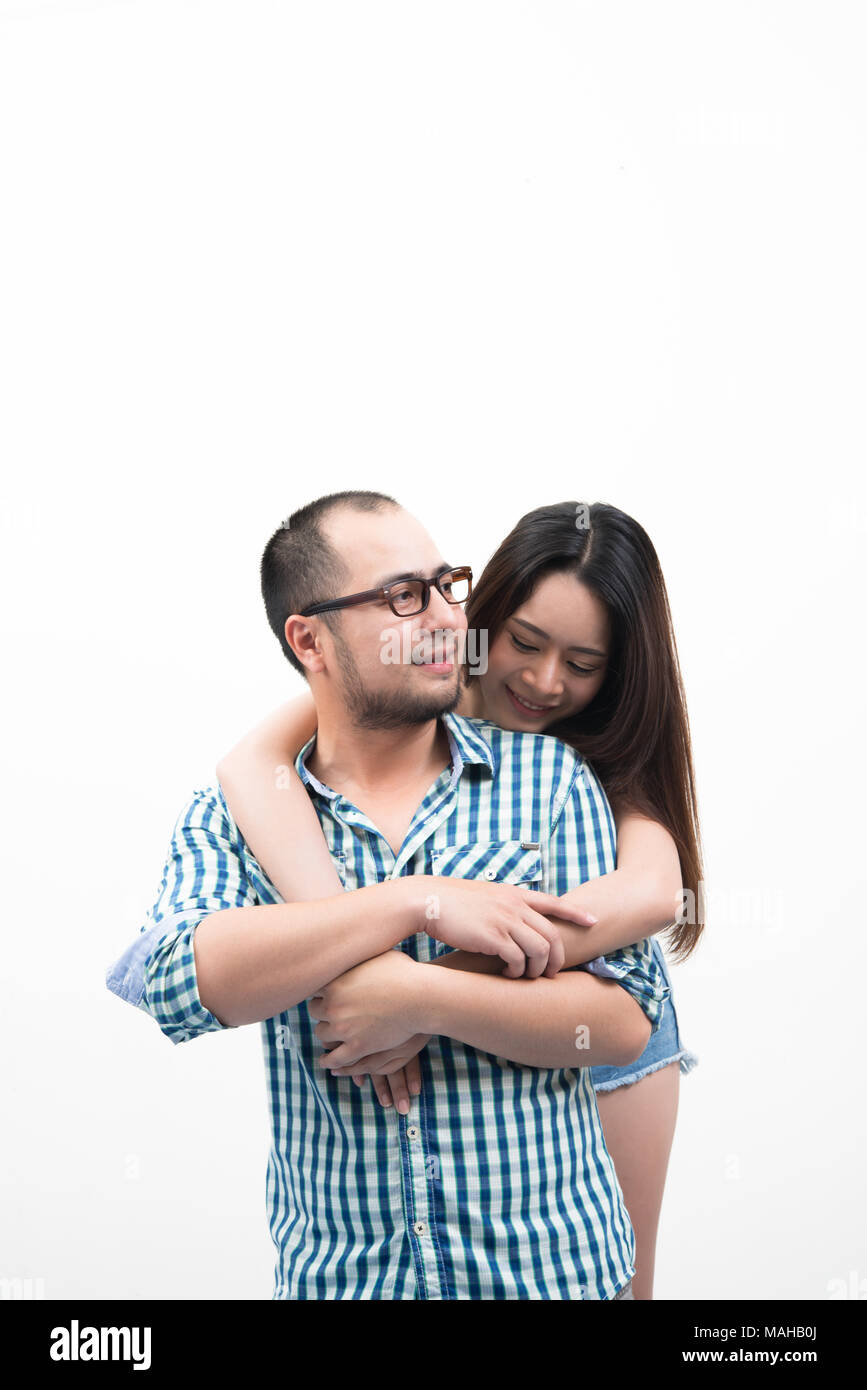 Portrait of young happy couple isolated on white background Stock Photo ...