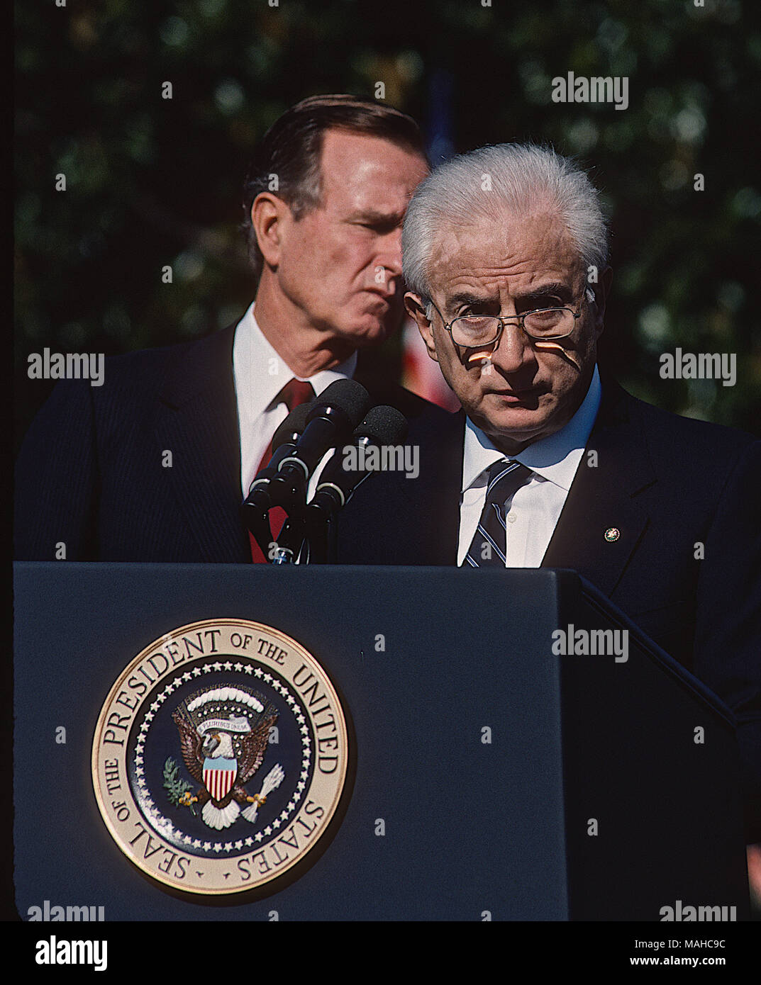 Washington, DC., USA, October 11, 1989 President George H.W. Bush greets Italian President Francesco Cossiga at the South Portico of the White House, where President Cossiga was accorded a formal welcome with full military honors. President Cossiga spoke in Italian, and his remarks were translated by an interpreter. Credit: Mark Reinstein/MediaPunch Stock Photo