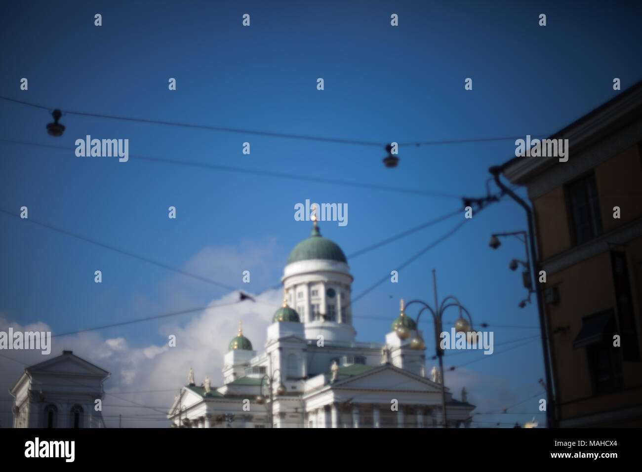 Helsinki Cathedral and the statue of tsar Alexander II in a beautiful summer day Stock Photo