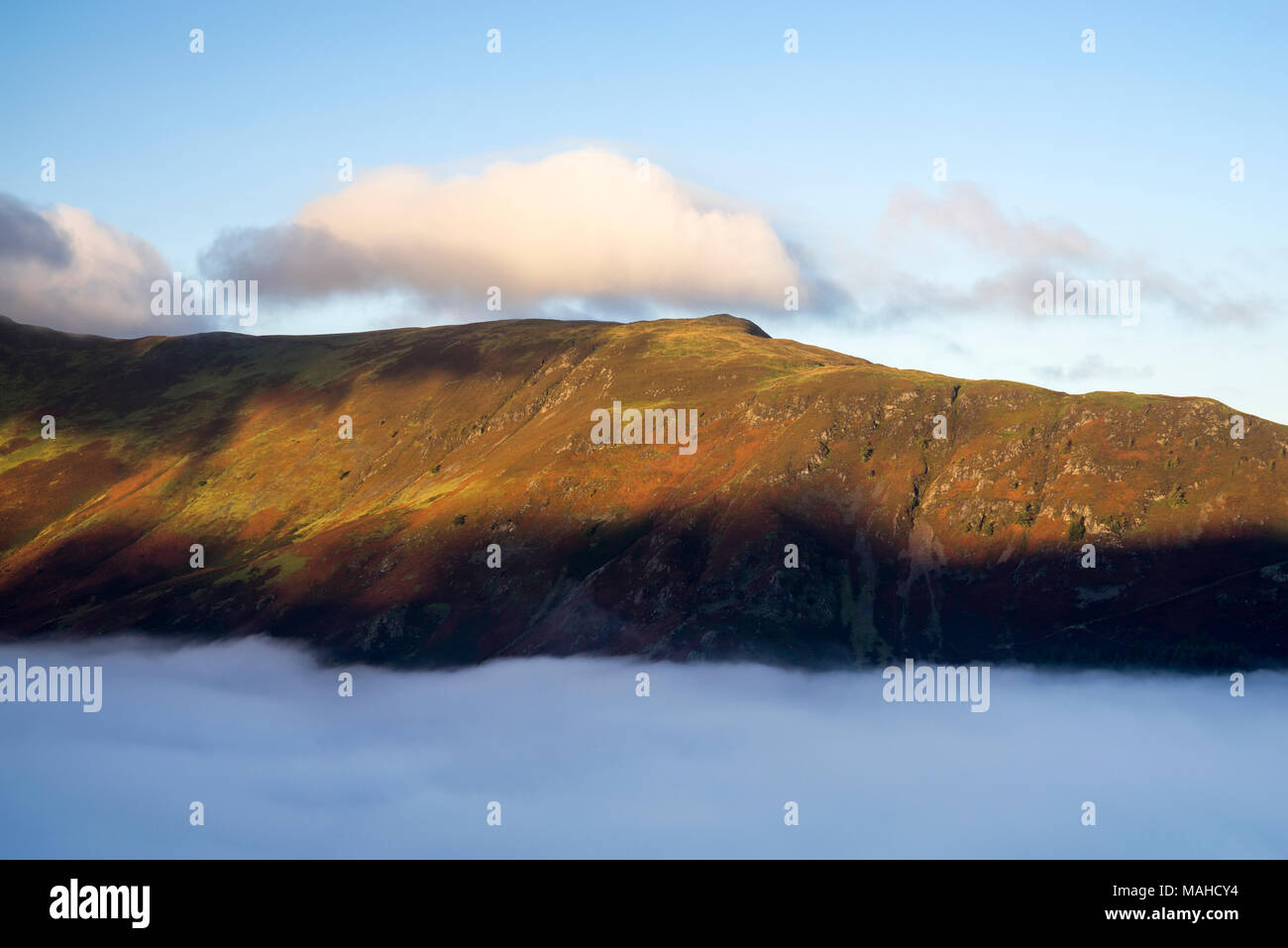 Cloud inversion over Derwentwater with Maiden Moor fell in the background.  Lake District, Cumbria, England, UK Stock Photo