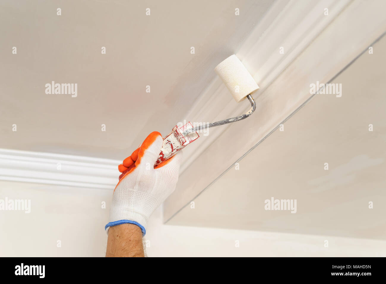 Painting Walls And Ceilings Painter Paints Using Roller Stock