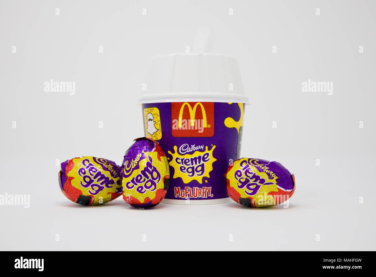 McDonalds Cadbury Creme Egg McFlurry cup with Cadbury Creme Eggs on a white background Stock Photo