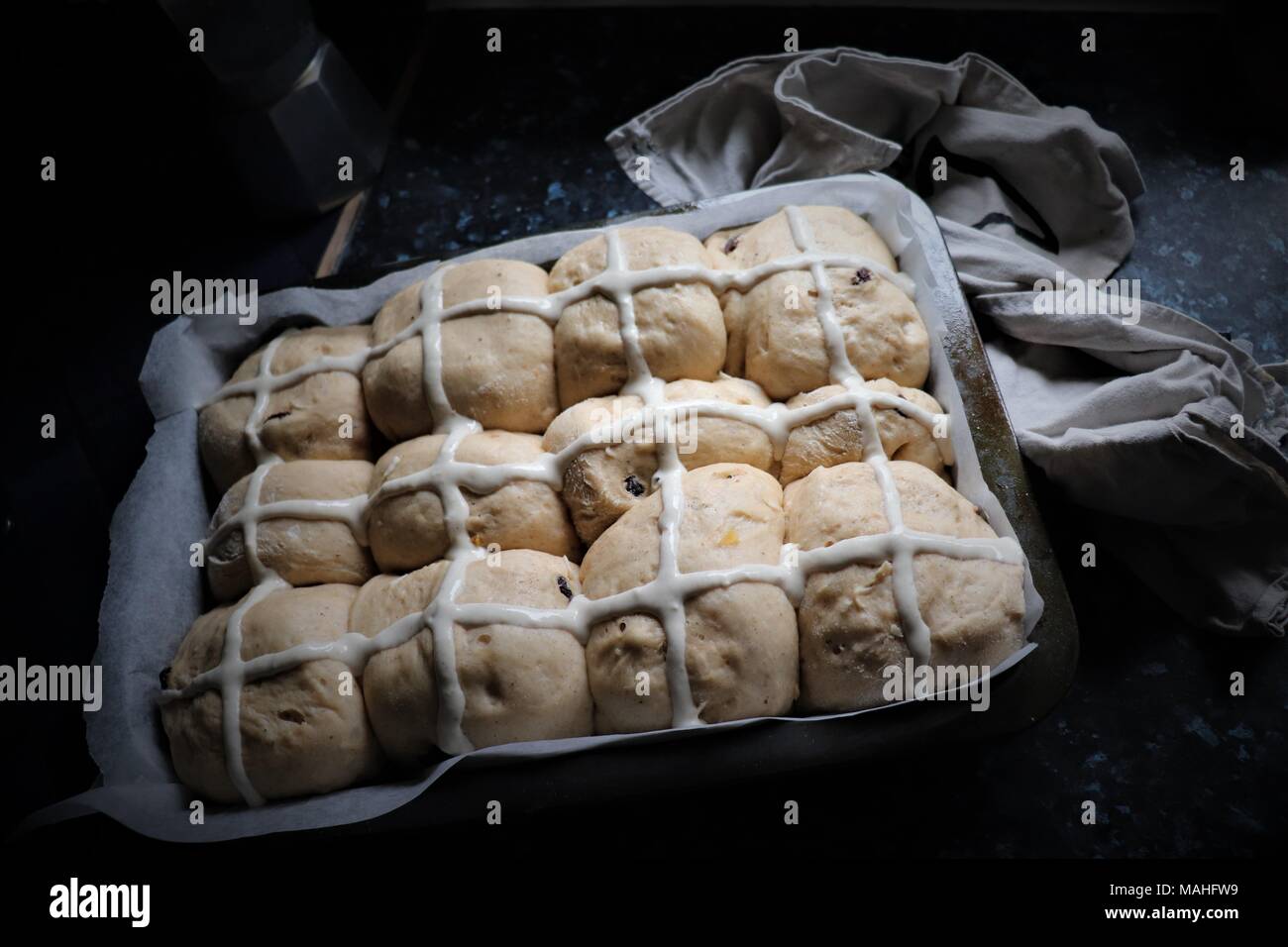 Home Made Hot Cross Buns About to go in the Oven Stock Photo