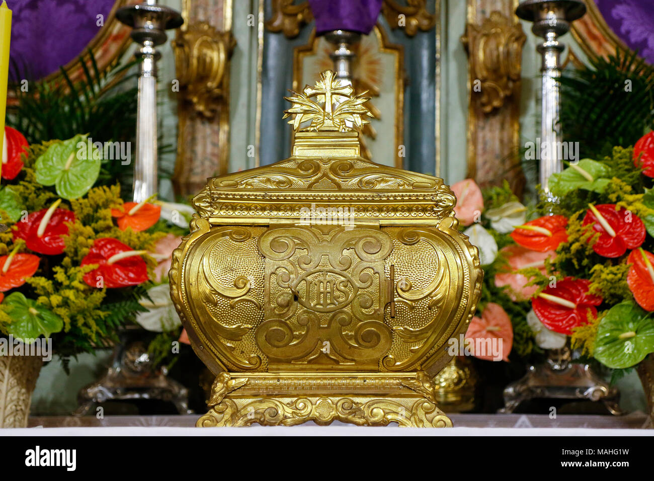 A symbol of Catholic devotion, exposed in church on the altar during adoration of the Blessed Sacrament Stock Photo