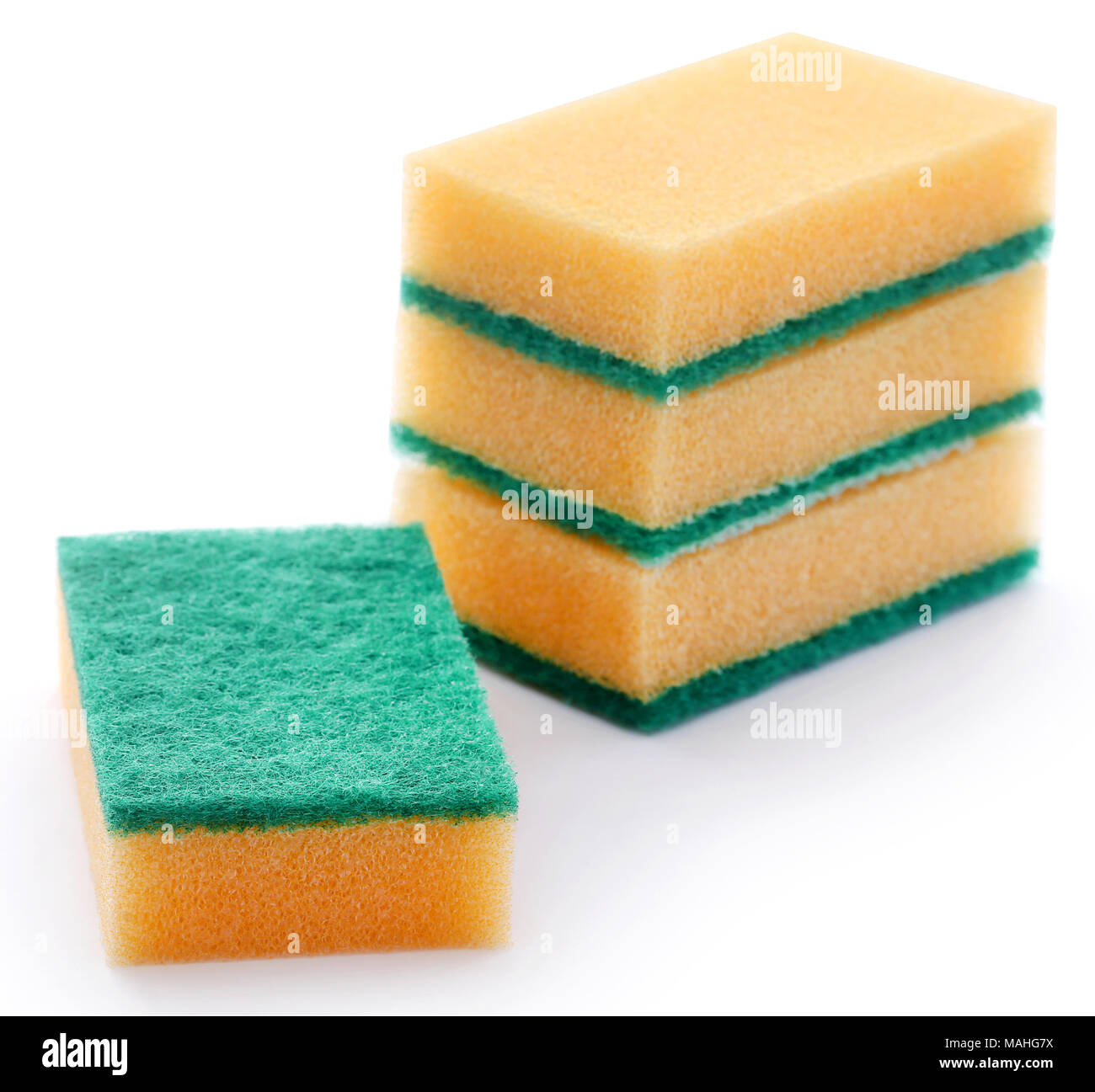 Kitchen sponge with scotch brite over white background Stock Photo