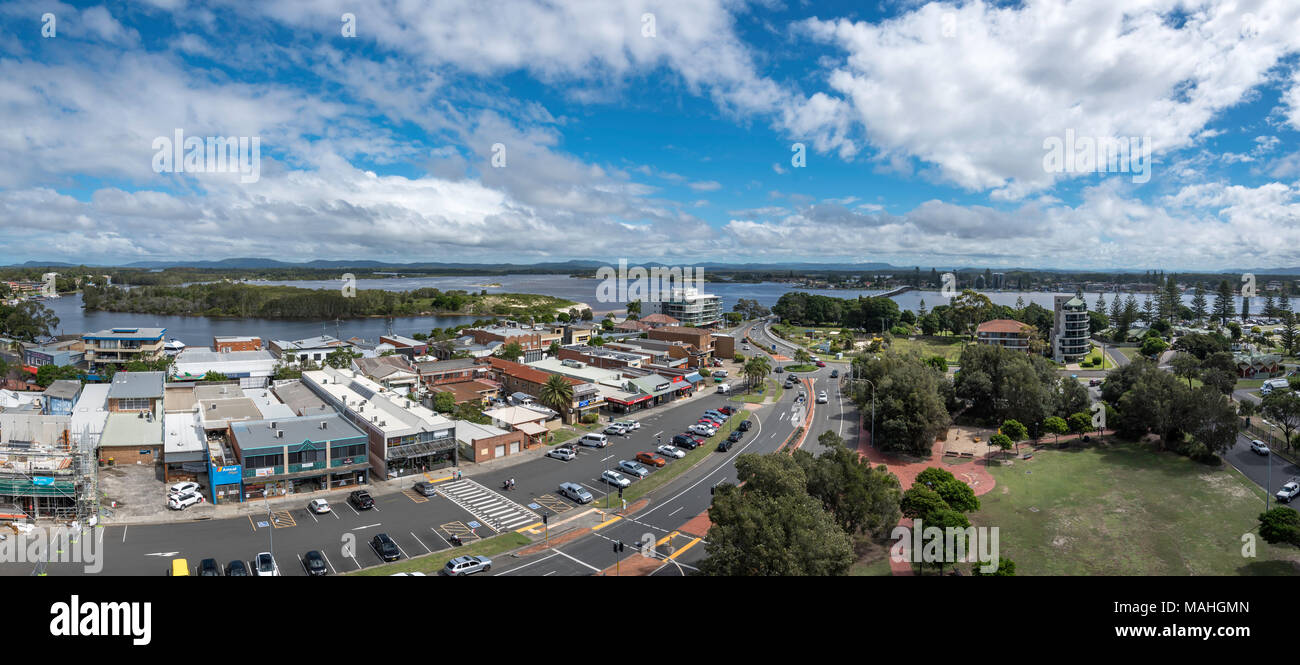 A panorama of the main shopping strip and car park in Forster NSW with the Forster Tuncurry bridge and Coolongolook River in the background Stock Photo