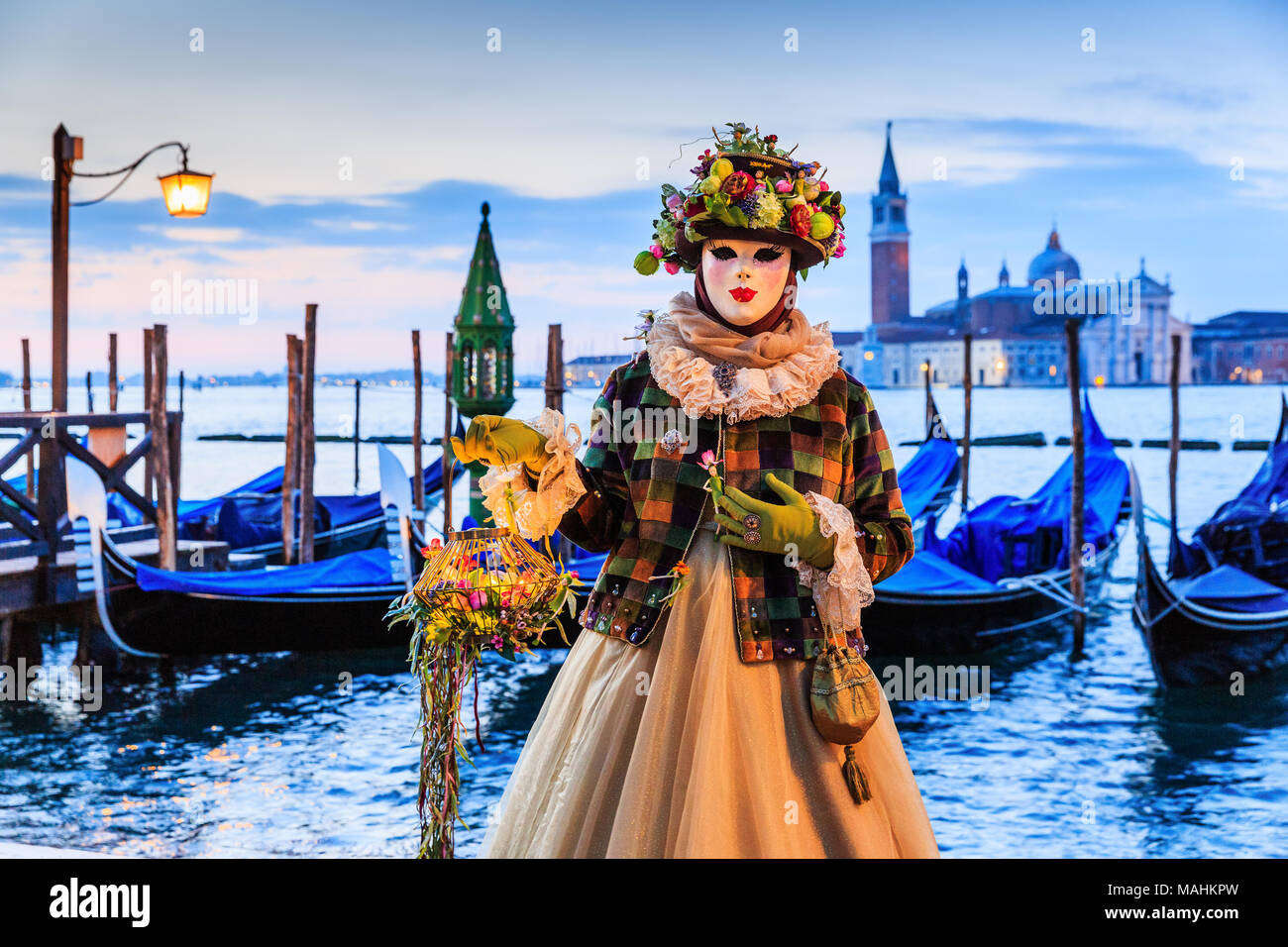 Venice, Italy. Carnival of Venice, beautiful mask at St. Mark's Square. Stock Photo