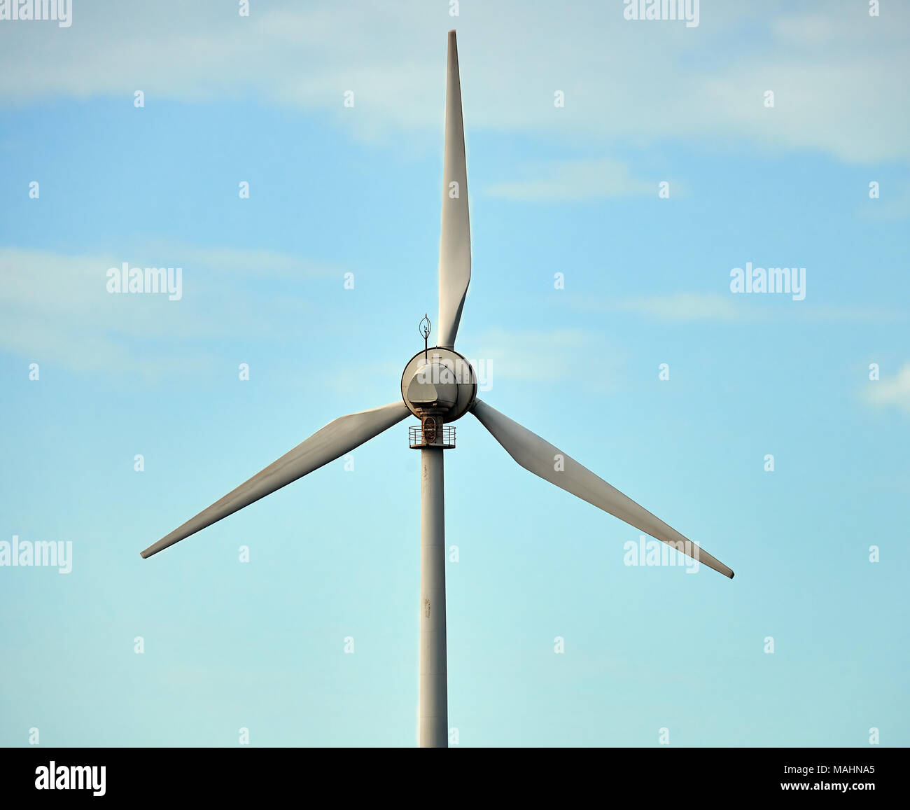 Single wind turbine photographed with the sky as background Stock Photo ...
