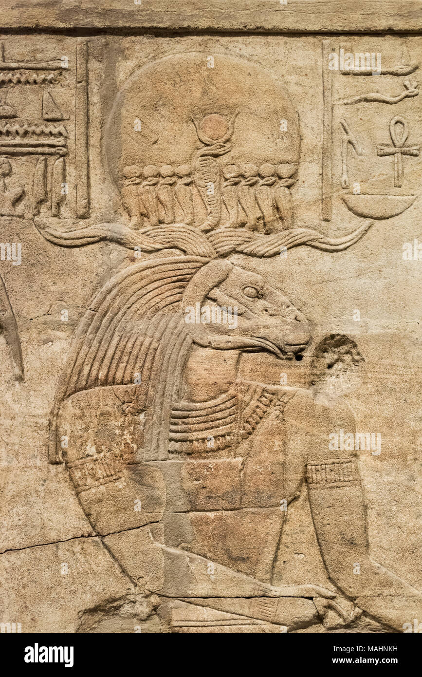 Oxford. England. Egyptian god Amun-Re (Amun / Amen Ra) with rams head, Shrine of King Taharqa (690–664 BC), Ashmolean Museum. Detail of bas-relief on  Stock Photo