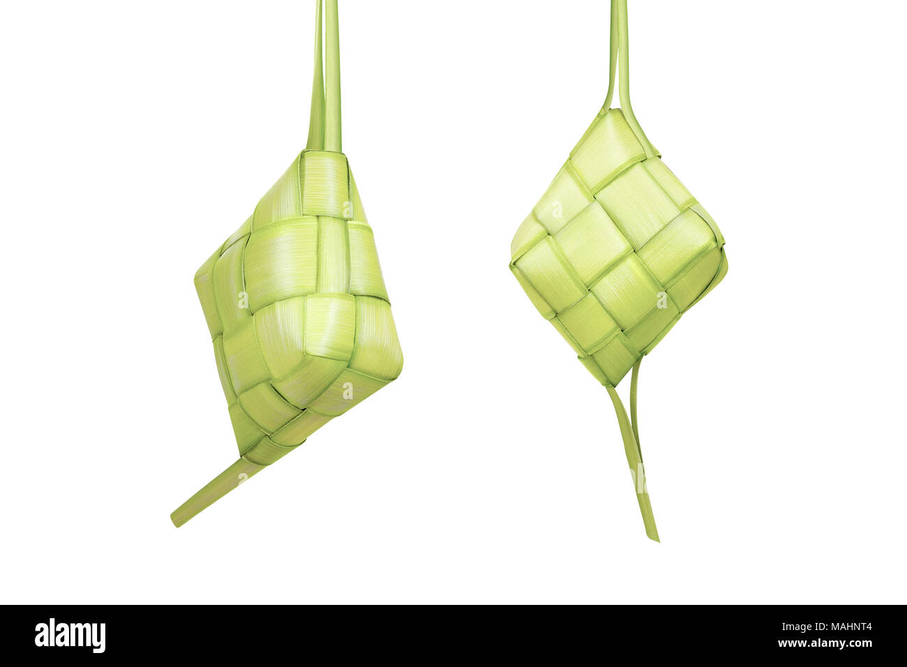 Rice dumpling or ketupat is traditional food for festive season isolated over white background Stock Photo