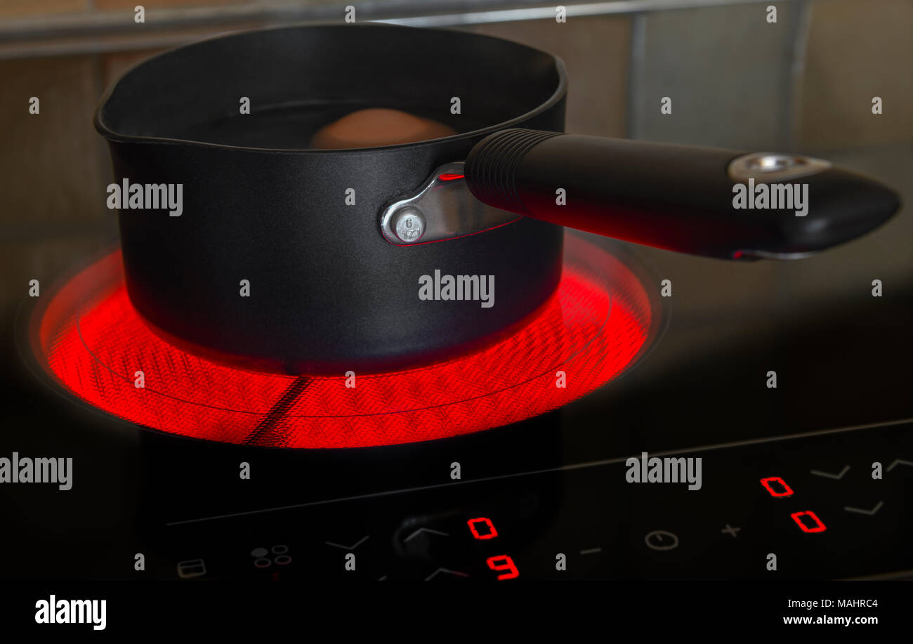 Cooking on ceramic hob hires stock photography and images Alamy
