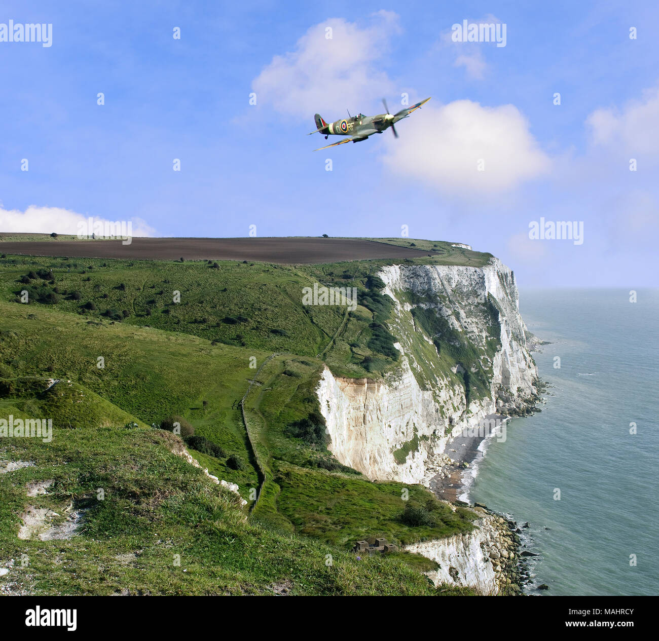 spitfire over the white cliffs of dover Stock Photo