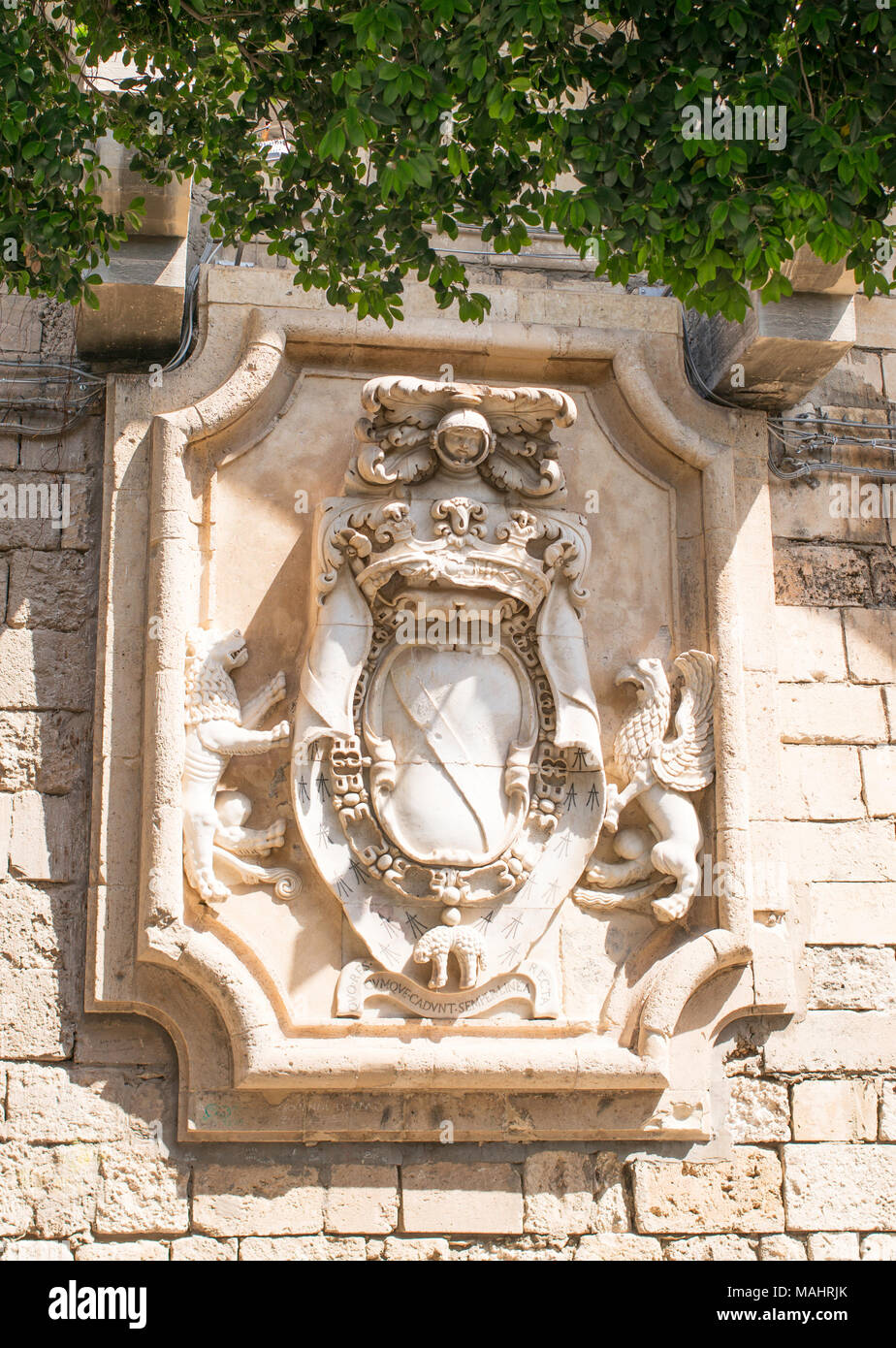 Coat of arm carved in stone, Foro Vittorio Emanuele II, Ortygia, Syracuse, Sicily, Europe Stock Photo