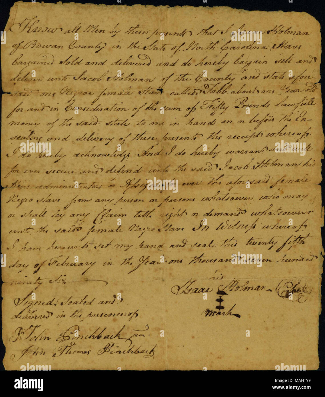 Sold by Isaac Holman of Rowan County, North Carolina, to Jacob Holman, also of Rowan County. [Notation on the back of the document certifies that the bill of sale was registered, October 19, 1796.] Title: Receipt for the sale of a one-year-old female slave named Tabb, February 25, 1796  . 25 February 1796. Holman, Isaac Stock Photo