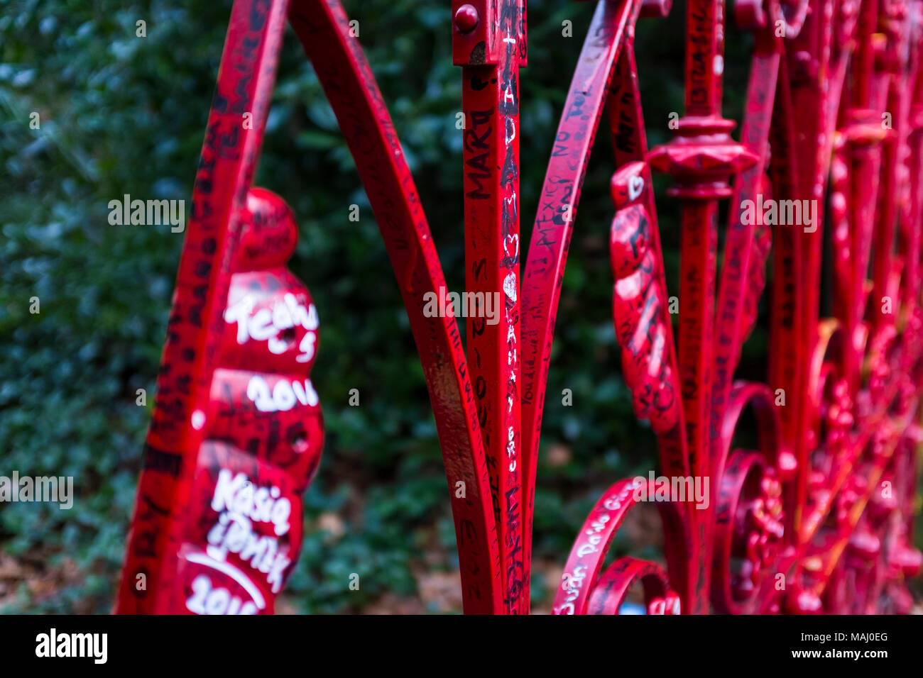 Graffiti adorns the gates and gate posts of Strawberry fields , the Liverpool children's home made famous by the Beatles song. Liverpool, England. Stock Photo