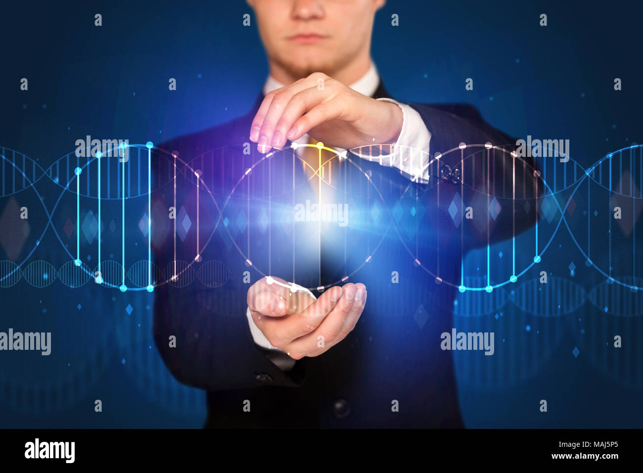 Businessman with DNA concept in his hands  Stock Photo