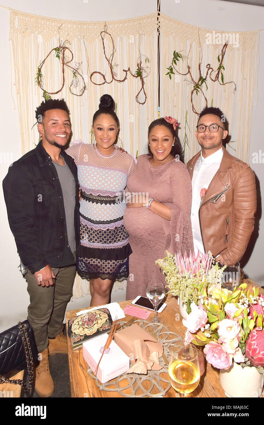 Tavior Mowry, Tamera Mowry, Tia Mowry and Tahj Mowry attend the Tia