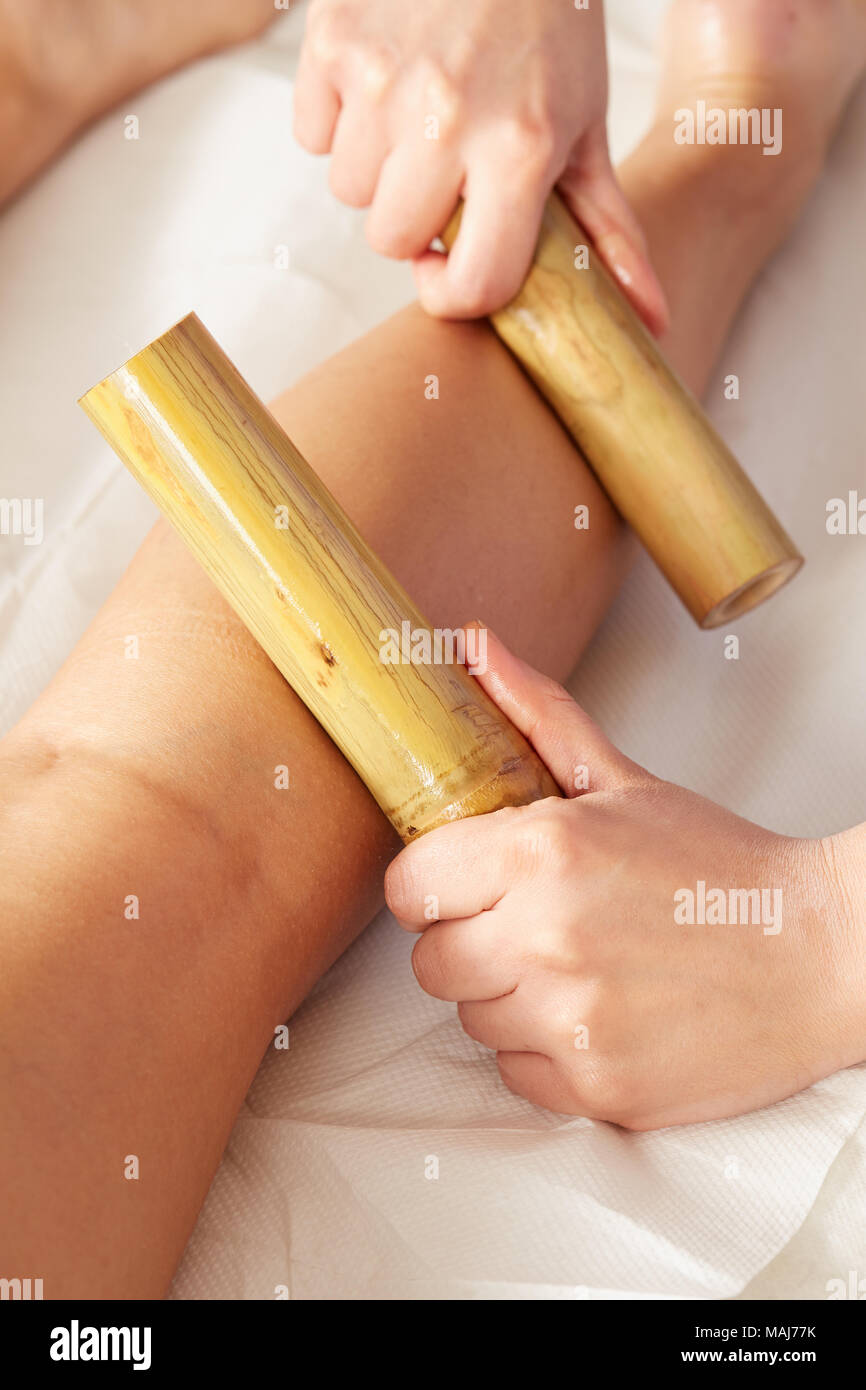 Bamboo massage feet hires stock photography and images Alamy