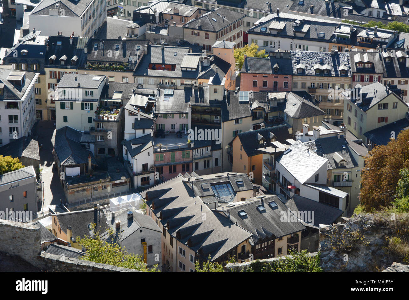 A view of the Swiss city of SIon, seen from the hilltop Basilique Notre Dame de Valère, in the upper Rhone Valley, canton of Valais, Switzerland. Stock Photo