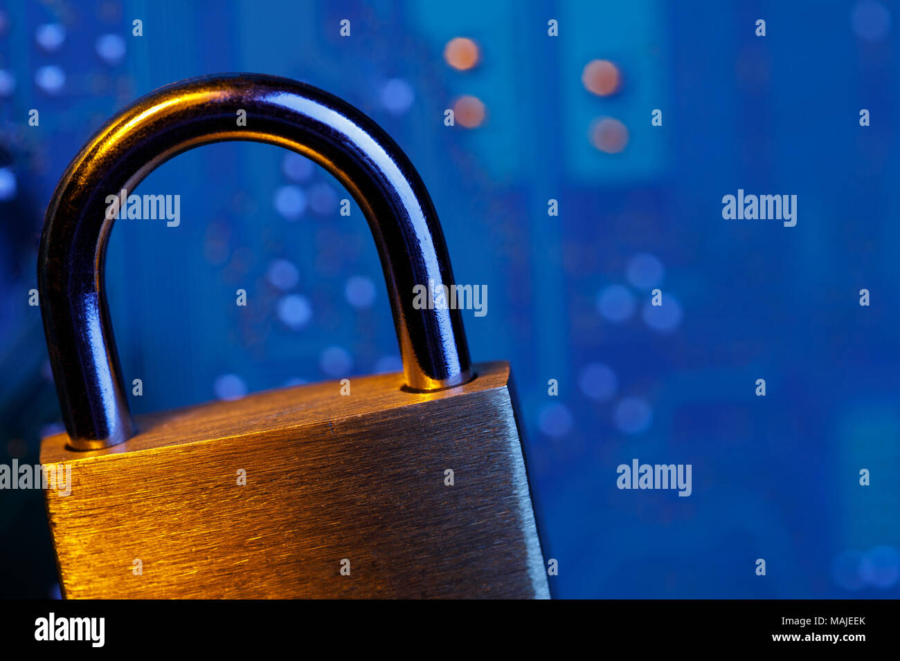 Digital security concept with space for text. Closed lock against the chip background Stock Photo