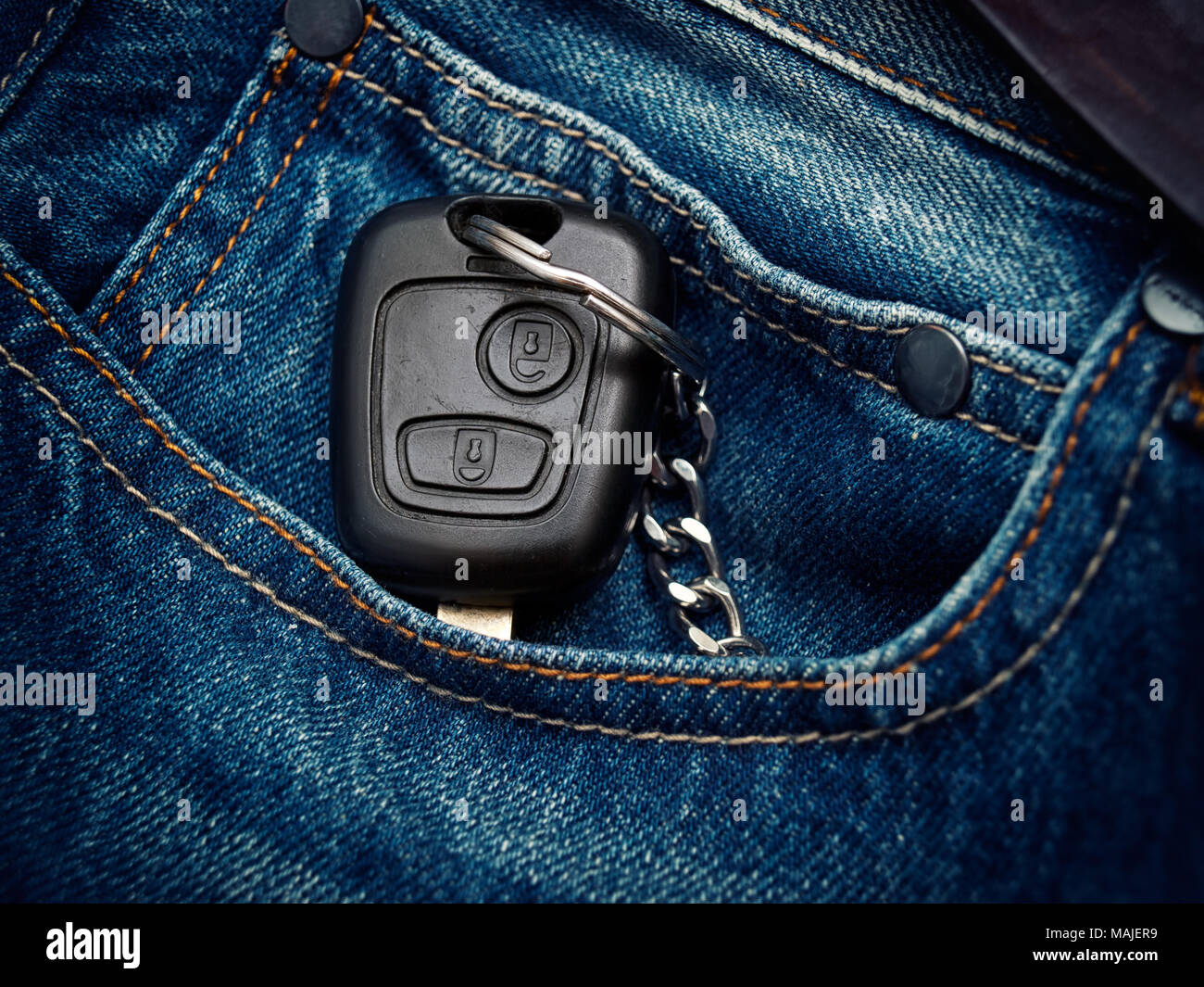 Car key in the jeans pocket. Stock Photo