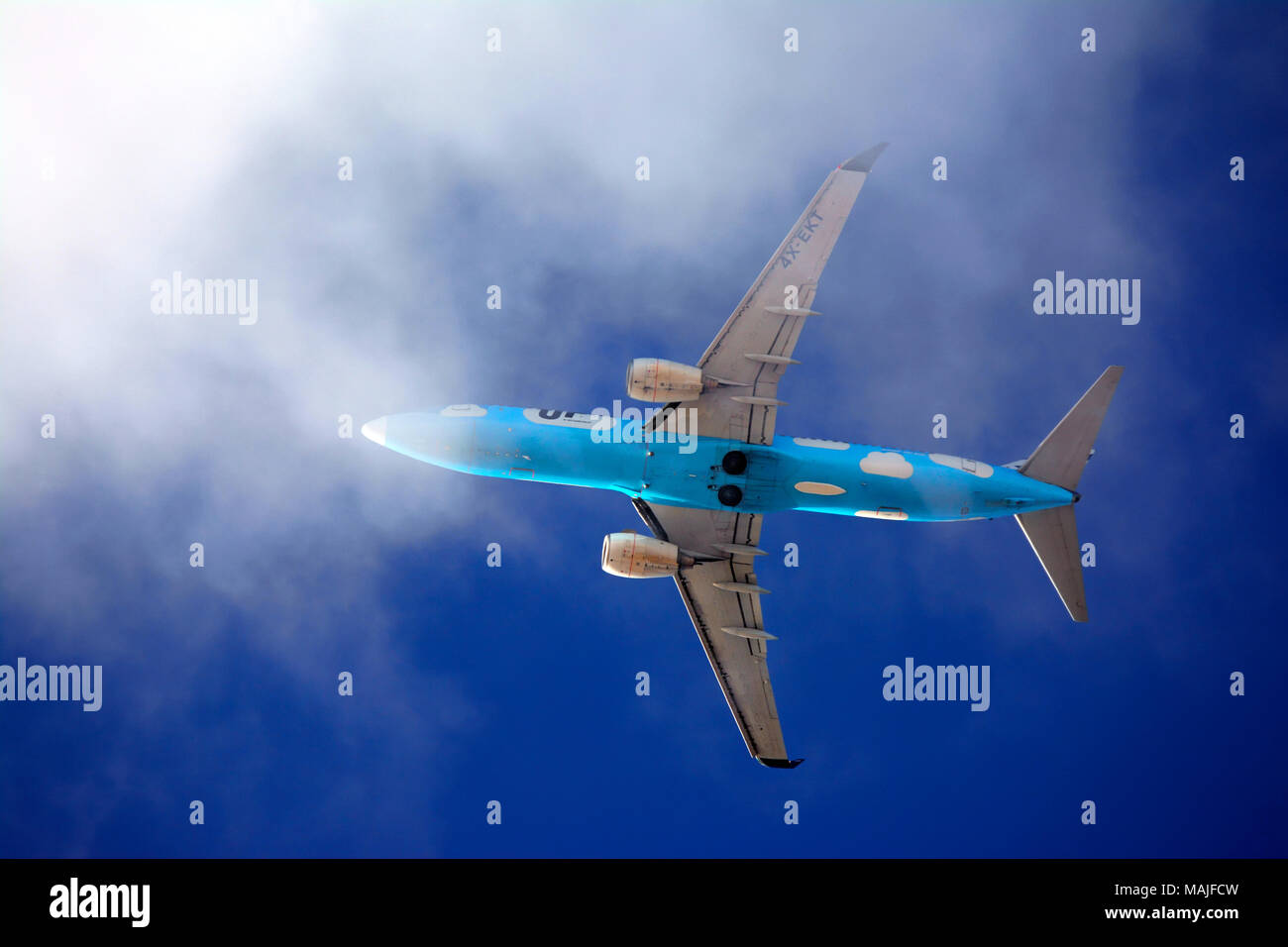 Airplane fly low Stock Photo
