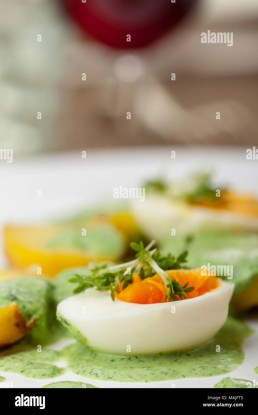 green sauce with eggs and potato Stock Photo