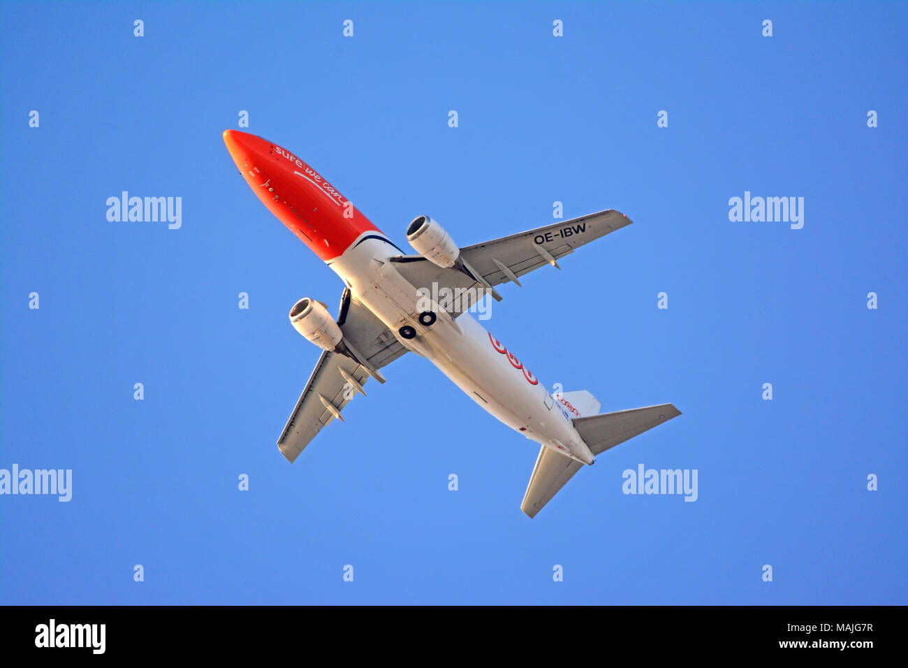 Airplane fly low Stock Photo