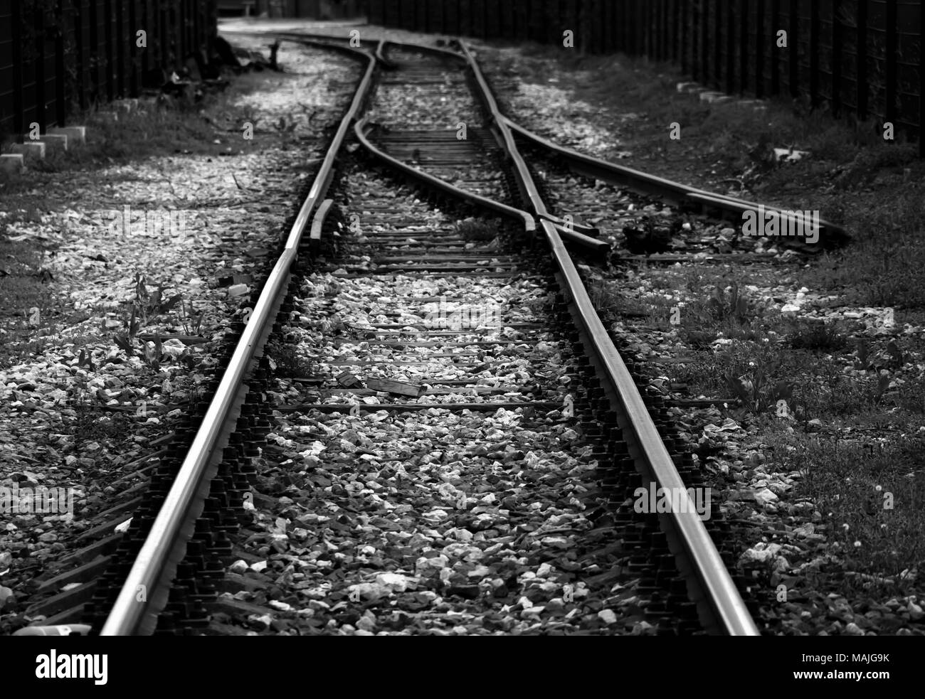 Vintage railway , old railroad train track in black and white Stock Photo