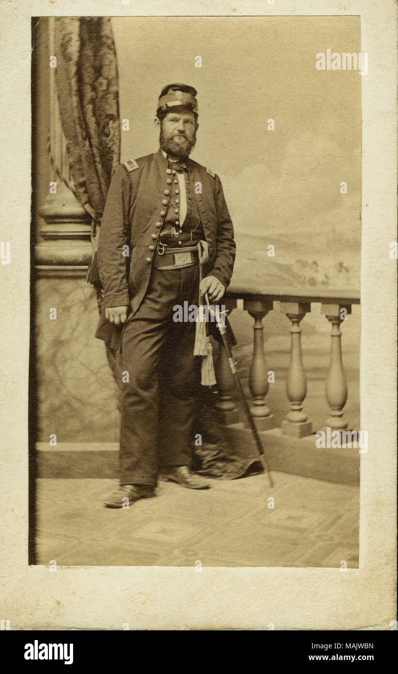 Full-length portrait of a man in uniform with sword, wearing a hat. 'Capt. Wm Mittmann Comp 'C' 12th Infty. Mo. Vols. 1863.' (written below image on album page). Mittmann served as a 1st Lt. in Co. B, 3rd Missouri Volunteer Infantry in 1861 on a 3 month enlistment and was presumably involved with the Camp Jackson Affair. He then served as a 1st lieutenant and then captain in Companies K and C, 12th Missouri Volunteer Infantry. Title: William Mittmann, Captain, Company C, 12th Infantry Missouri Volunteers (Union).  . 1863. H. E. Hoelke, St. Louis Stock Photo