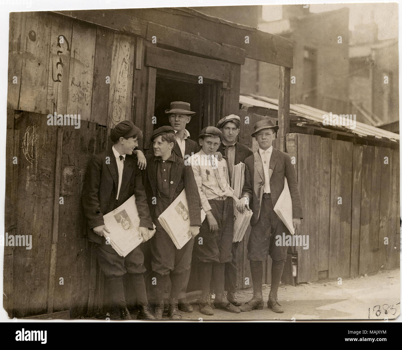 Title: St. Louis Star-Times newsboys on street.  . 1910. Lewis Hine Stock Photo