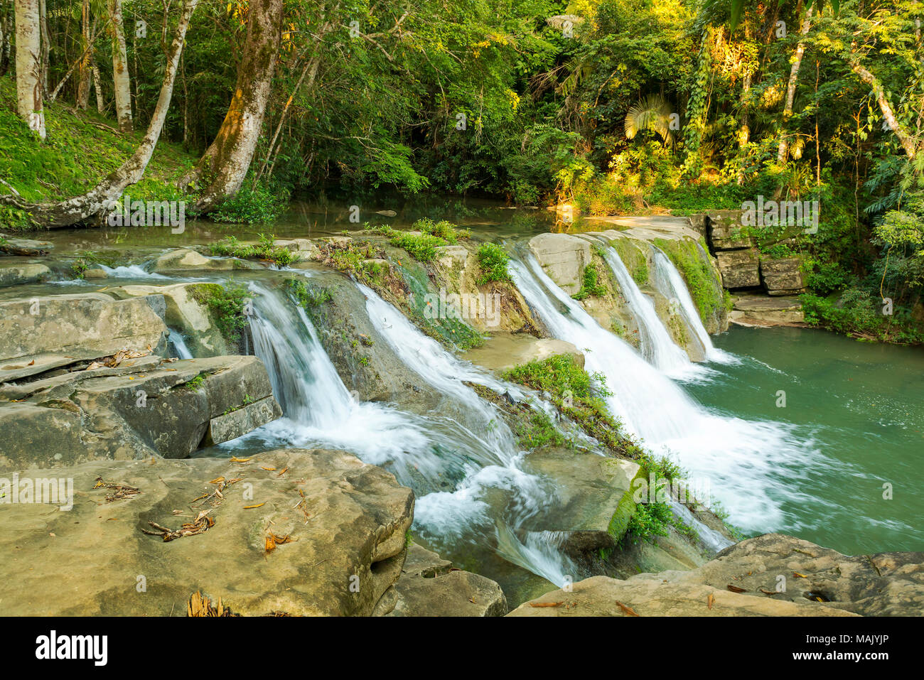 Natural water cascades of San Antonio waterfall in Toledo Belize Stock Photo